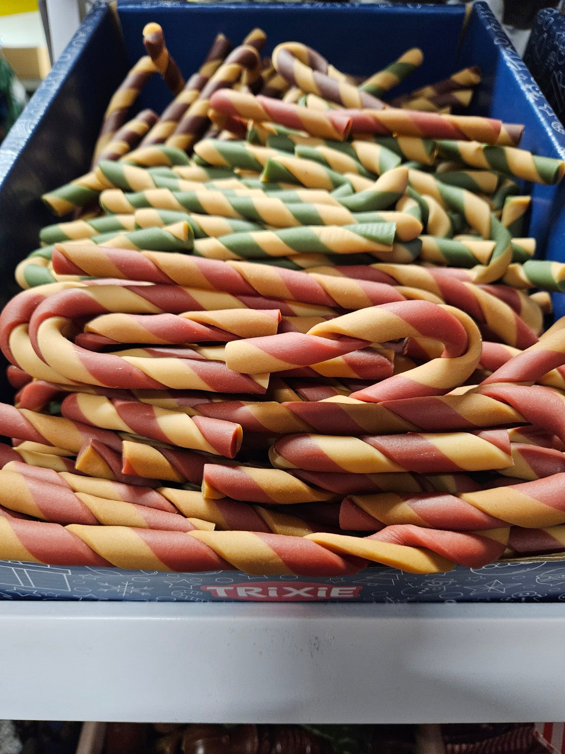 TRIXIE candy cane chews included in the Merry Woofmas box